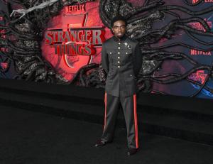 Caleb McLaughlin at the "Stranger Things" Season 5 World Premiere held at the TCL Chinese Theatre on November 06, 2025 in Los Angeles, California.