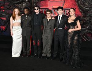 Sadie Sink, Caleb McLaughlin, Finn Wolfhard, Gaten Matarazzo, Noah Schnapp and Millie Bobby Brown at the "Stranger Things" Season 5 World Premiere held at the TCL Chinese Theatre on November 06, 2025 in Los Angeles, California.