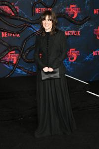 Winona Ryder at the "Stranger Things" Season 5 World Premiere held at the TCL Chinese Theatre on November 06, 2025 in Los Angeles, California.