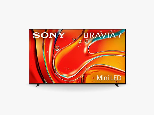 Large screen tv with yellow and orange abstract art on the screen 