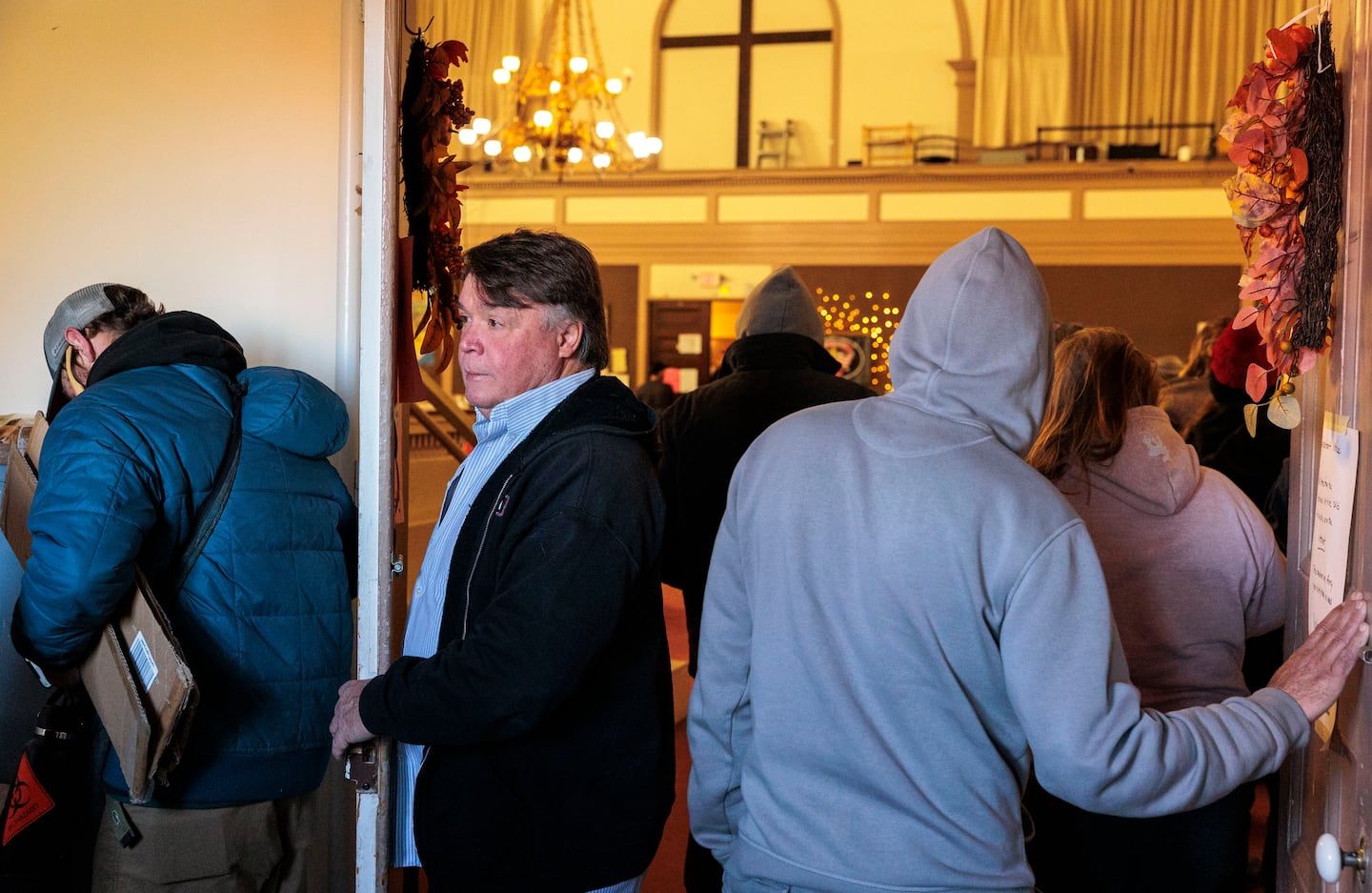 Senior pastor Leon welcomed visitors in search of fresh clothes, food, and other health services at Bangor’s Brick Church entrance.  “We’re the hub for the city,” said Leon, who has helped lead the church’s operation to offer free services to those in need amid the largest HIV outbreak in the state’s history.