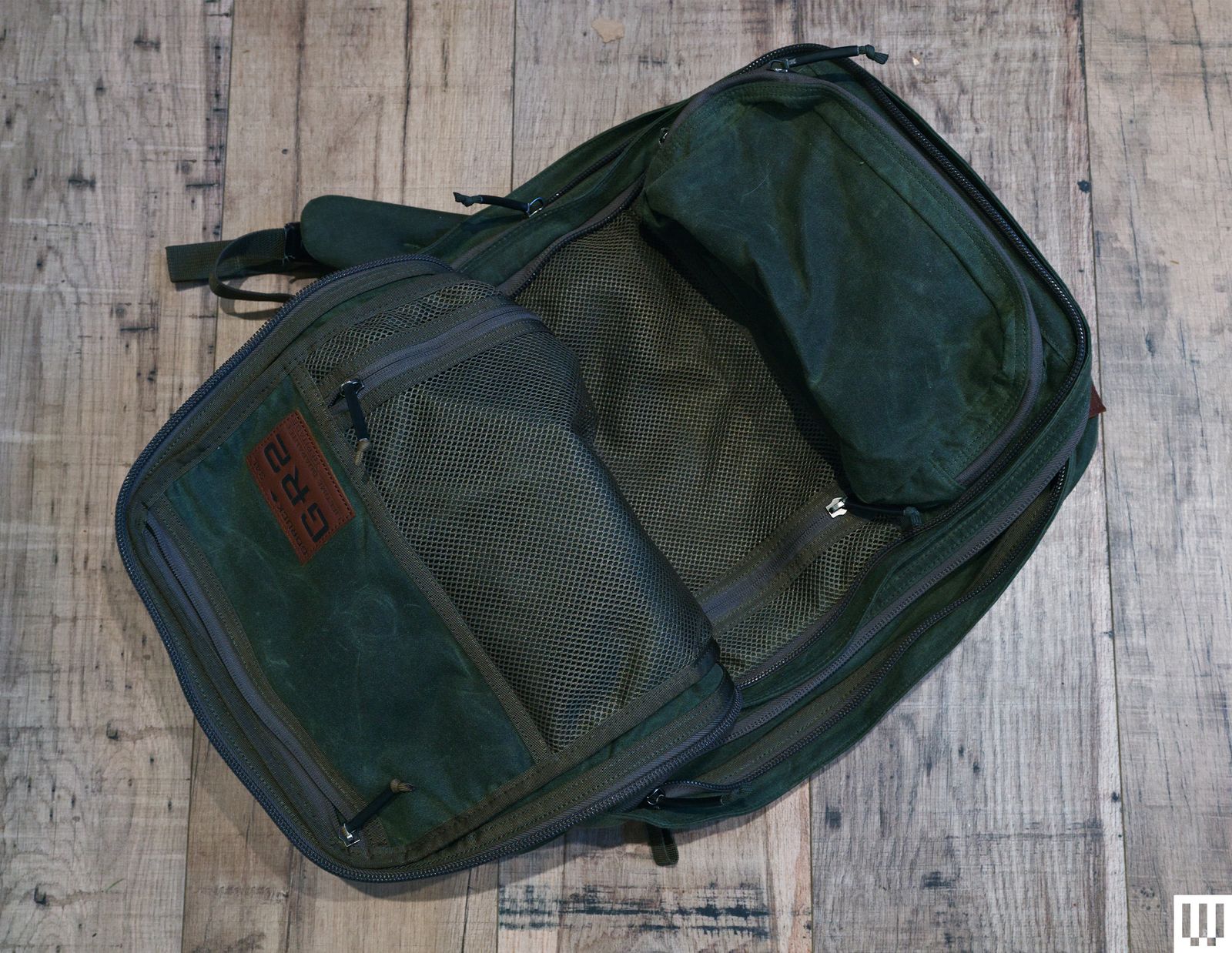 Which GoRuck Backpack GR2 green bag on wood floor