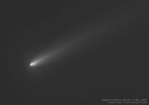 three fuzzy white blobs on a black background