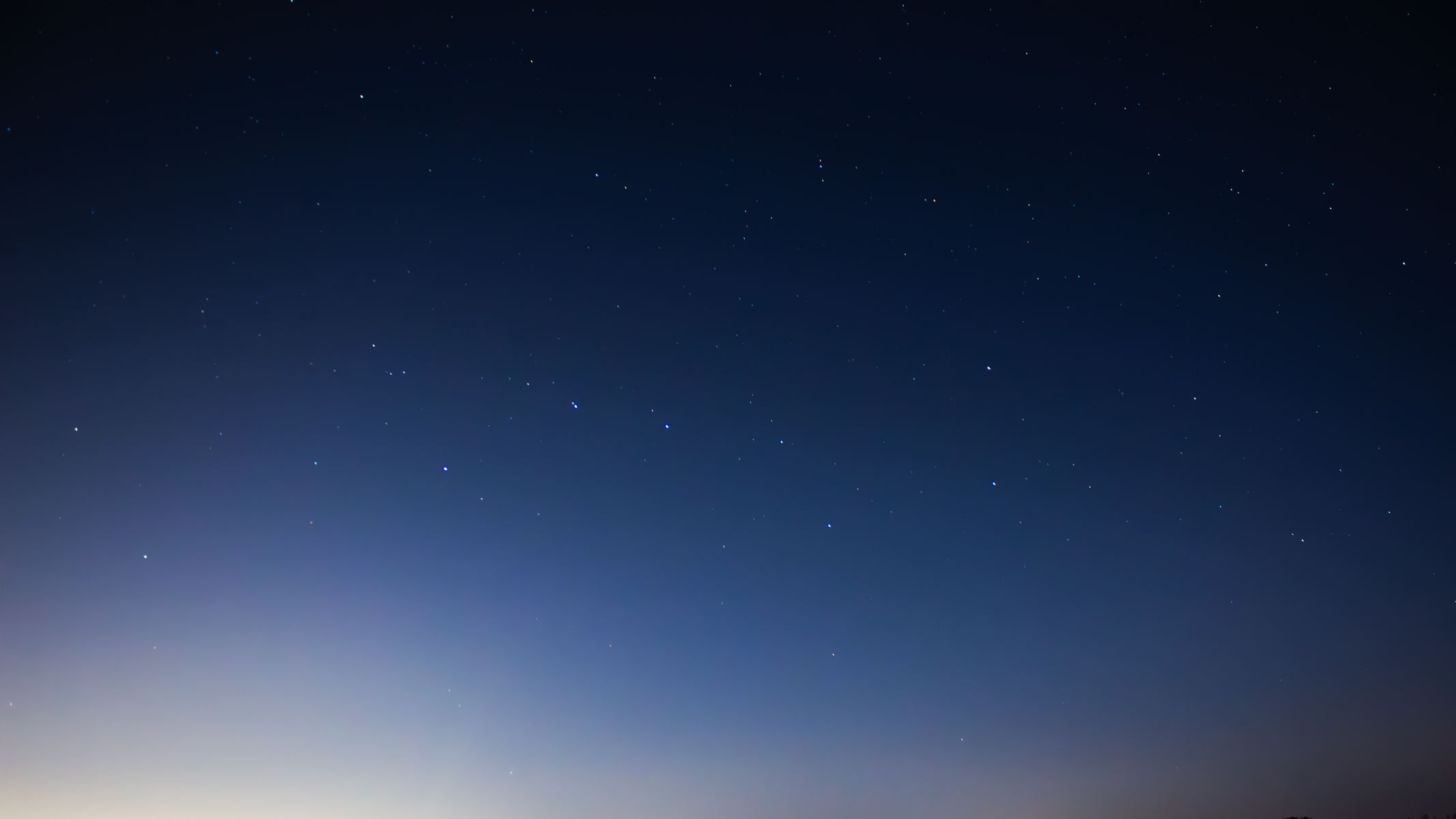 The Big Dipper asterism in the starry night sky.