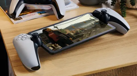 Getty Images A PlayStation Portal - it looks like a PS5 controller split in half with a screen in the middle.