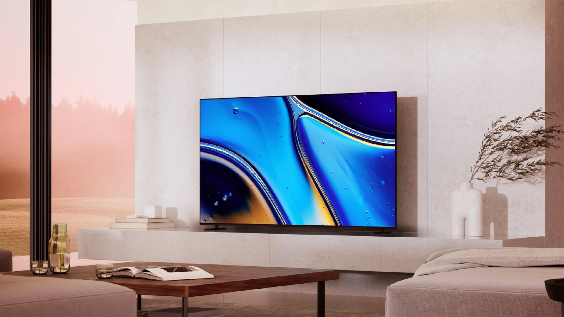 The Sony Bravia XR8B OLED TV displaying a colorful, abstract picture in a monochromatic living room