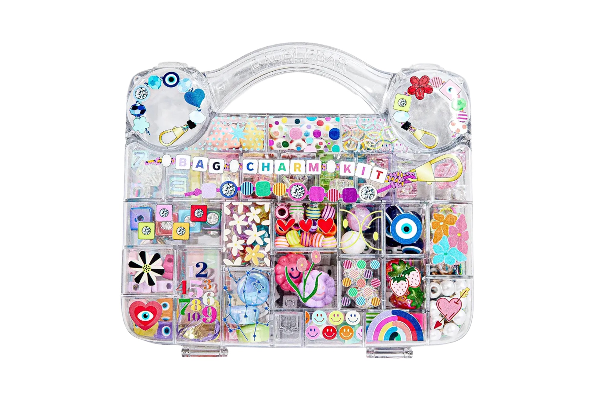 A clear plastic carrying case filled with colorful beads and charms, labeled "BAG CHARM KIT".