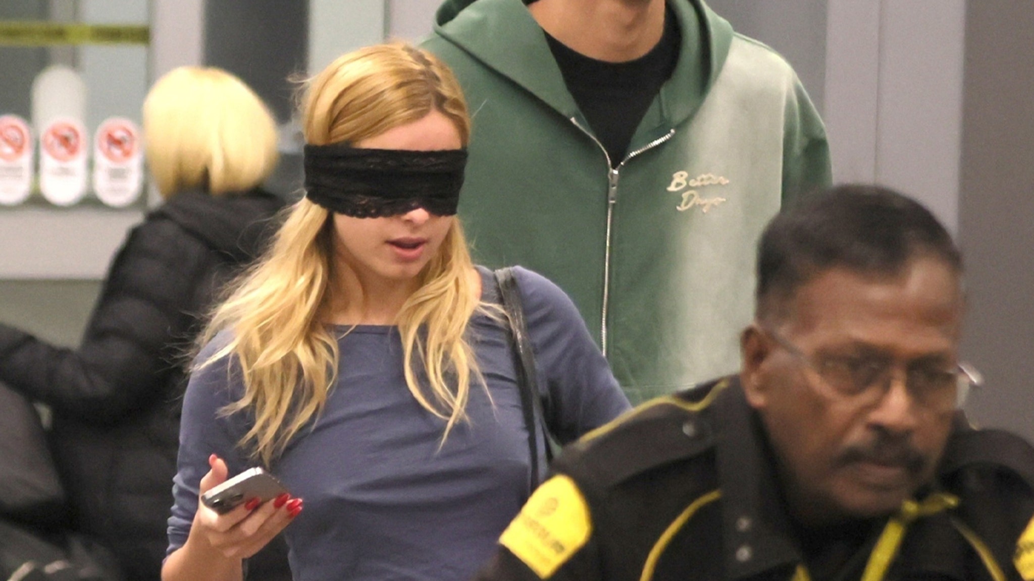  Addison Rae Wears Eye Mask On Her Way Out of Airport