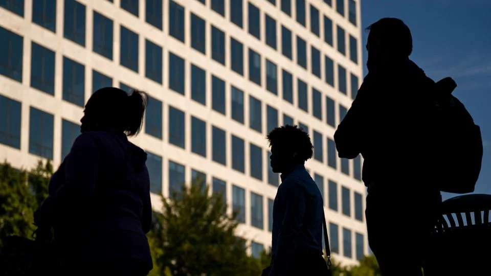 Commuters on October 1, in Washington, DC. - Al Drago/Getty Images