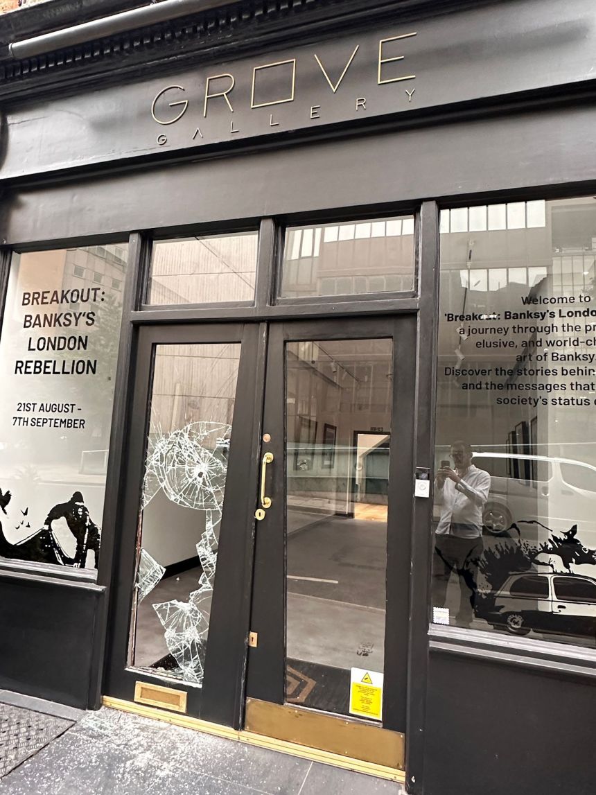 Damage to the Grove Gallery after the print was stolen.