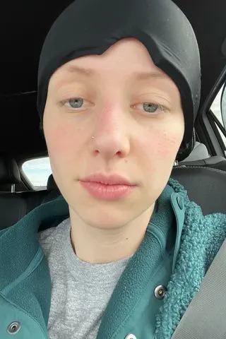SWNS Kelsey Stoksted takes a selfie amid her ongoing cancer struggle.