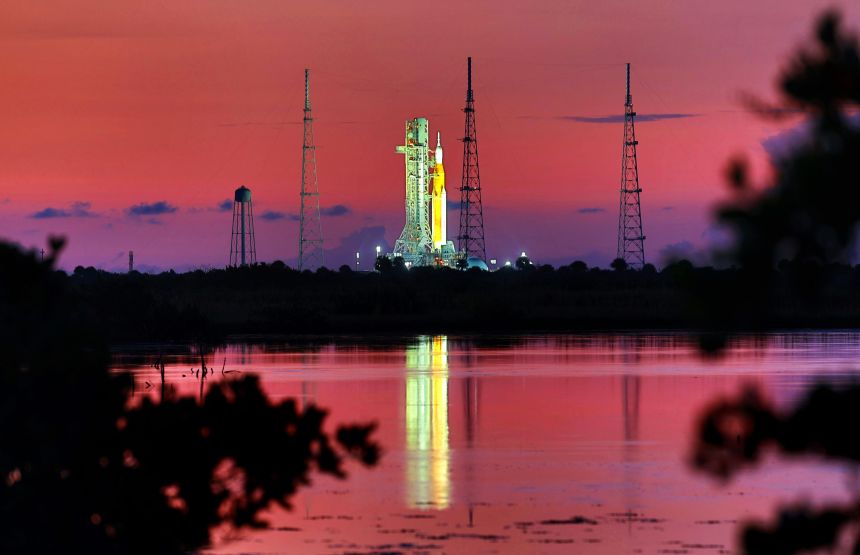 The Lockheed Martin-built Orion spacecraft, sitting atop NASA's Space Launch System rocket, is positioned on a launchpad at Kennedy Space Center in Florida ahead of the Artemis I launch in 2022. Lockheed has proposed using spare parts from Orion to construct a two-stage lunar lander.