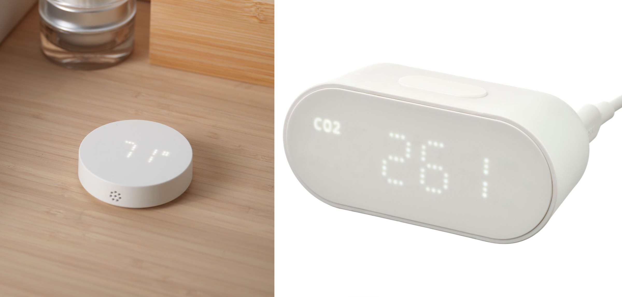 A puck-shaped temperature sensor on a wooden desk and an air quality sensor showing CO2 levels on a pixelated LED display.