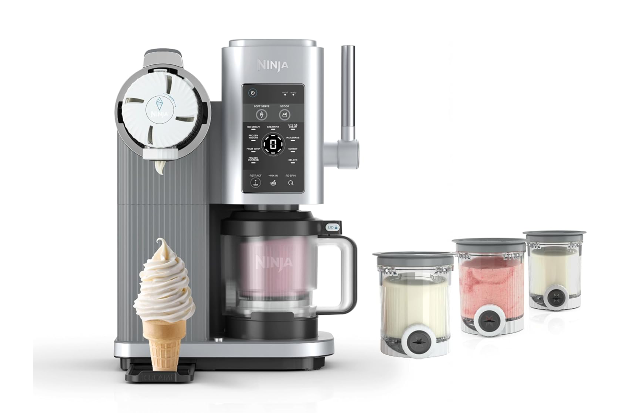 A Ninja CREAMi Deluxe soft-serve ice cream maker with a soft-serve cone, three pint containers, and a mixing paddle.