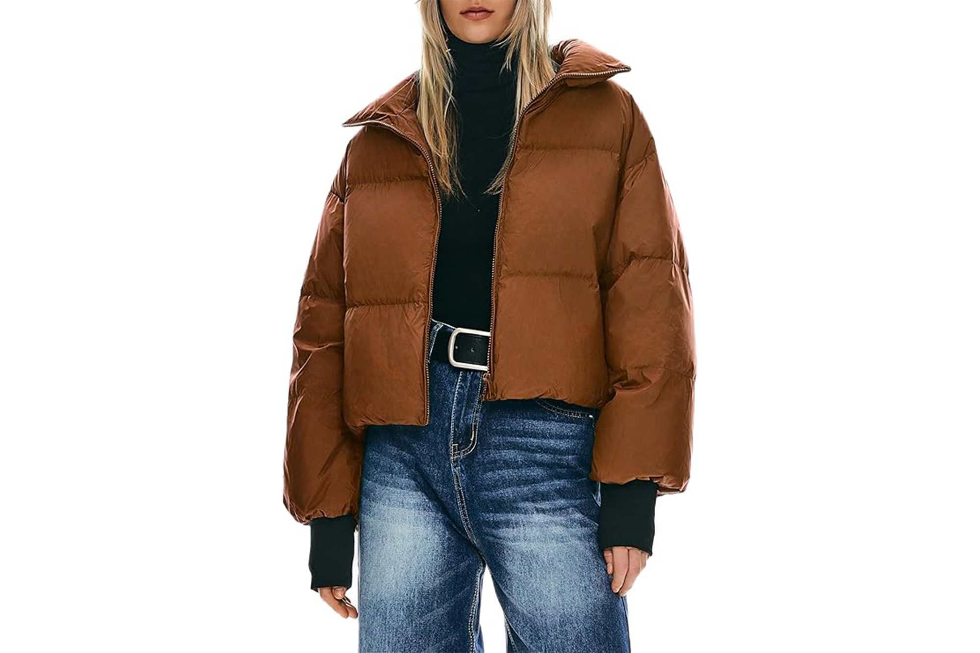 Model wearing an Orolay brown cropped puffer coat with blue jeans and a black turtleneck.
