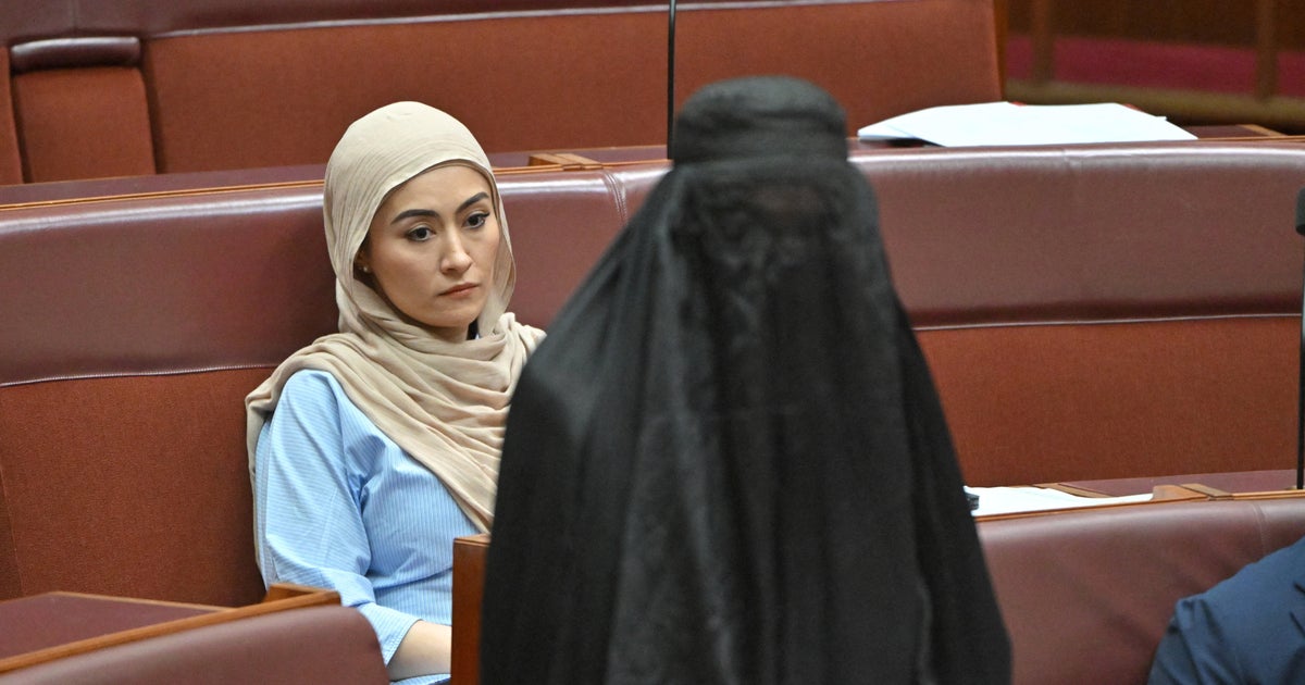  Australian Senator Pauline Hanson banned from parliament for 7 days for wearing burqa to demand they be banned