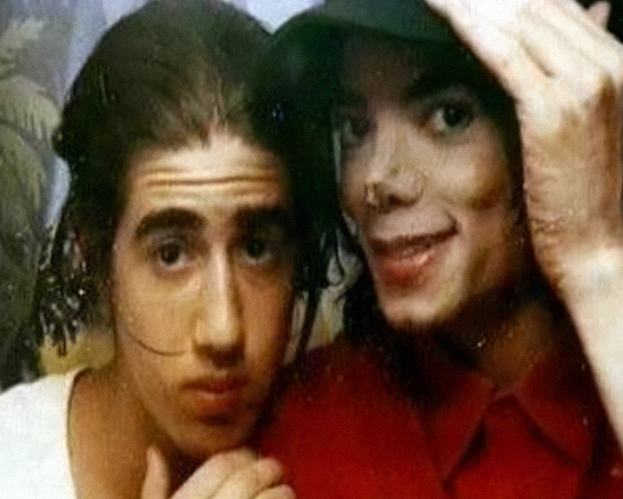Michael Jackson with a sibling in a candid photo highlighting siblings’ disturbing new allegations amid biopic trailer release.