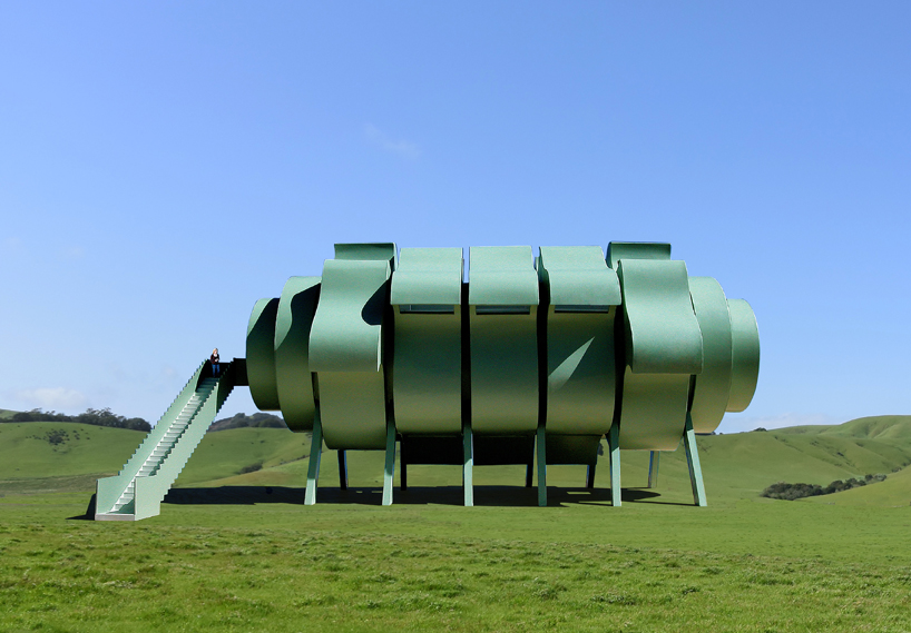 five rotating modules reconfigure to form interactive segmented house of the future