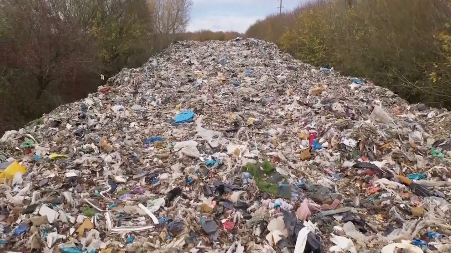 Mountain of illegally dumped trash causes outcry in England