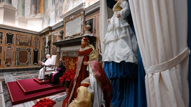 The Pope reads his speech in the Vatican's Clementine Hall