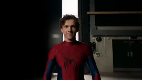 Sony/Marvel Tom Holland as Spider-Man standing in an empty film studio