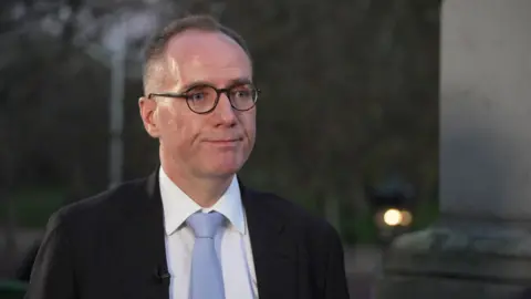 BBC OBR chairman Richard Hughes being interviewed for BBC News