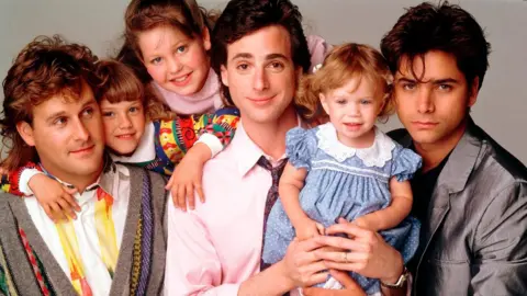 Getty Images Left to right: Dave Coulier (Joey), Jodie Sweetin (Stephanie), Candace Cameron (D.J.), Bob Saget (Danny), Ashley Olsen (Michelle), John Stamos (Jesse) in Full House