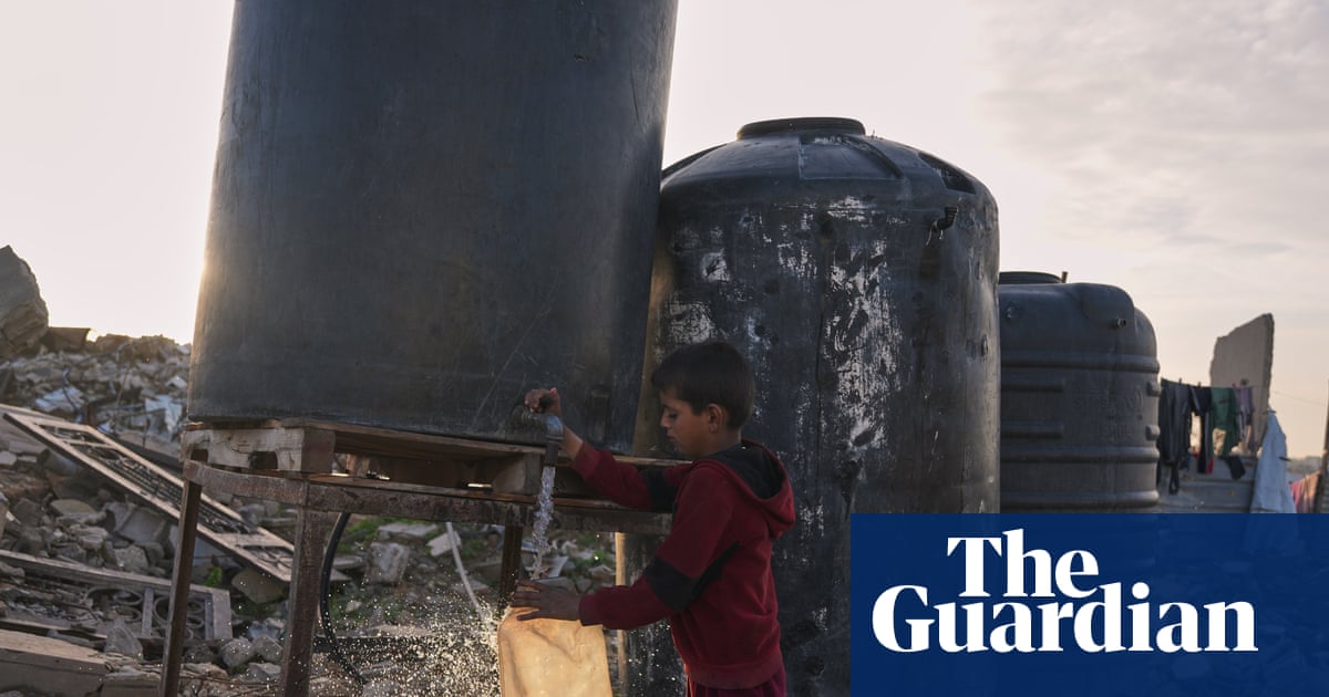  Israel to ban dozens of aid agencies from Gaza as 10 nations warn about suffering | Gaza