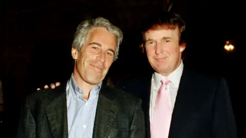 Davidoff Studios/Getty Images Jeffrey Epstein and Donald Trump pose for photo together