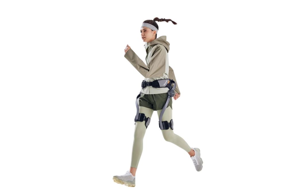 Person running while wearing the Hypershell Pro exoskeleton.