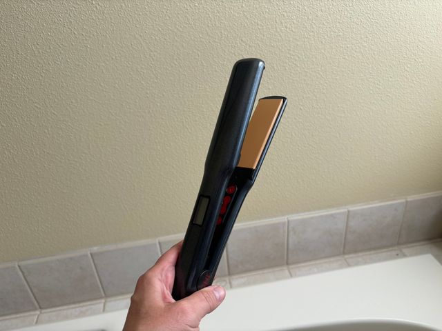 Image may contain: Electronics, Phone, Mobile Phone, Baby, and Person