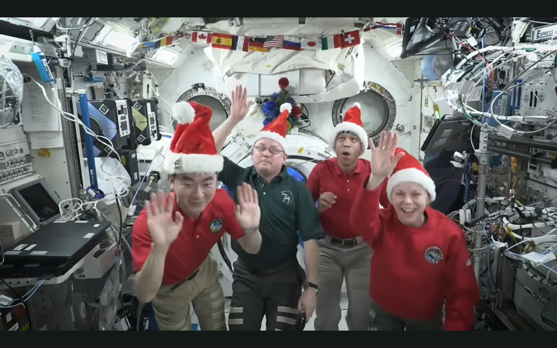  Astronauts beam home Christmas wishes from International Space Station: ‘I think we may be orbiting a little higher than Santa’ (video)