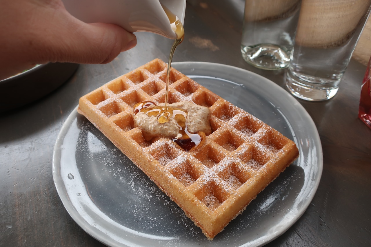 Yeasted waffles with hazelnut praline butter and Vermont maple syrup at Fair Weather, the brunch standout turned cafe from the seafood specialists at Southeast Portland's Jacqueline.