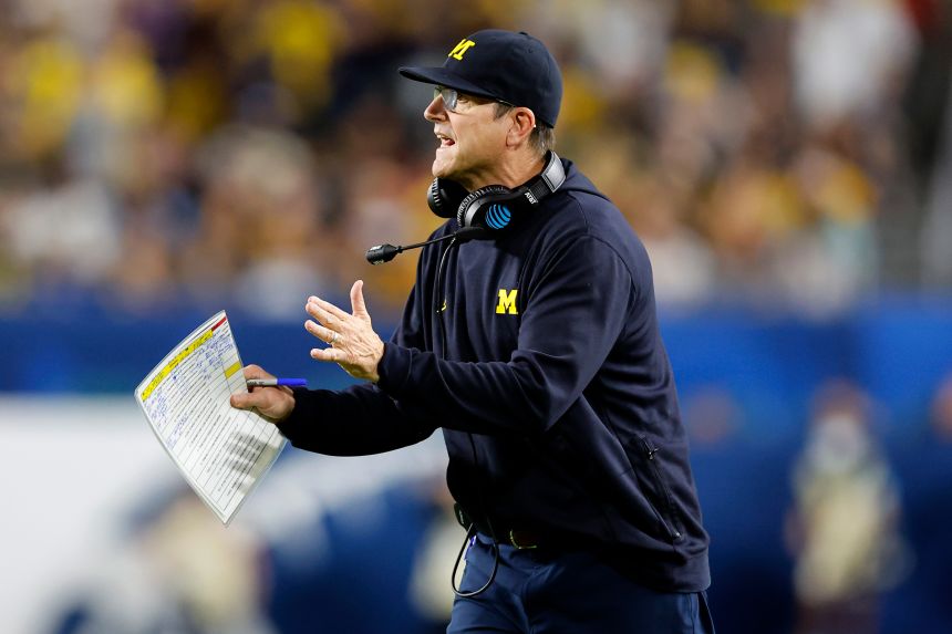 Head Coach Jim Harbaugh of the Michigan Wolverines on the sidelines during a game against the Georgia Bulldogs on December 31, 2021, in Miami Gardens, Florida.