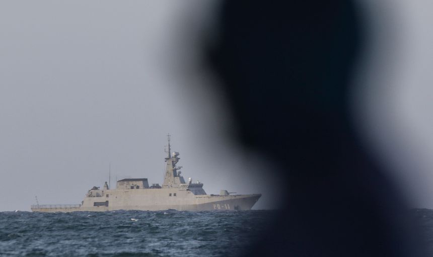 A Venezuelan navy patrol boat patrols near the El Palito refinery in Puerto Cabello, Venezuela on November 11.