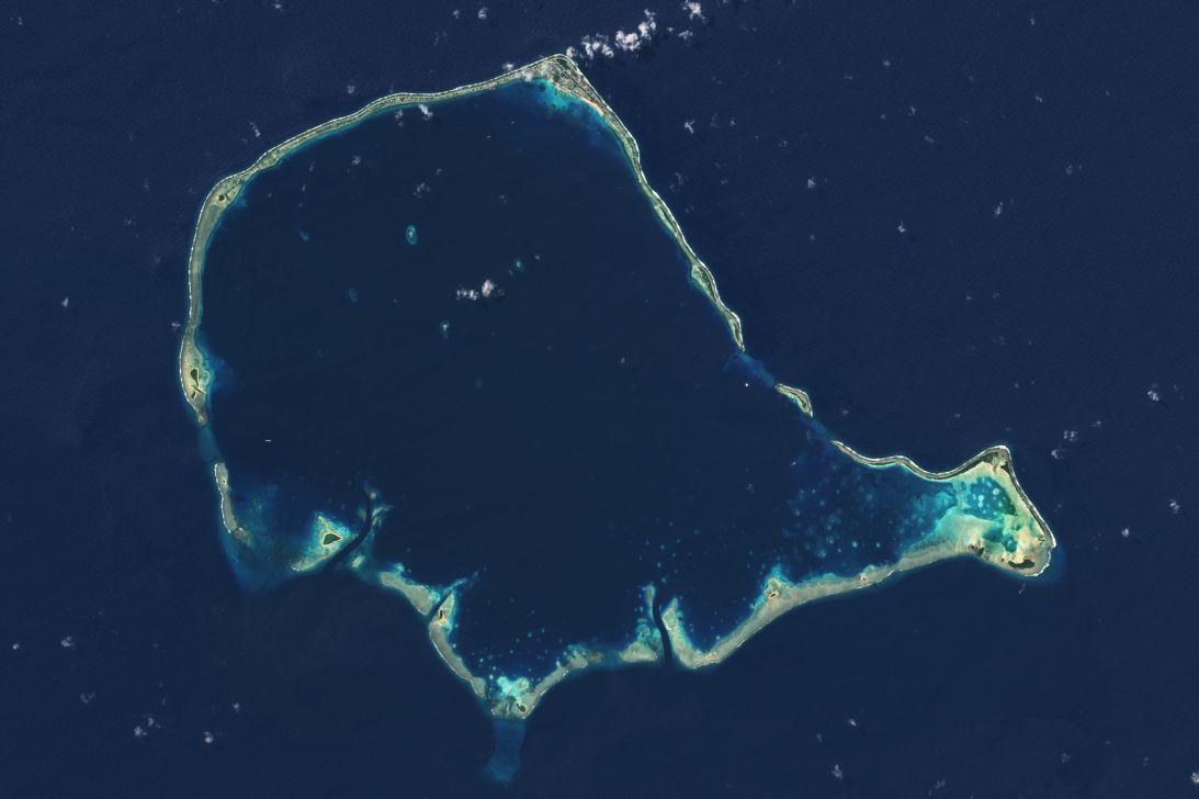 A view of Funafuti, Tuvalu, from satellite shows one of the most climate-threatened places on Earth. This low-lying island faces rising sea levels, coastal erosion and freshwater shortages, with tidal flooding now common during high tides. Most of Funafuti sits barely a meter — 3.3 feet —  above sea level.