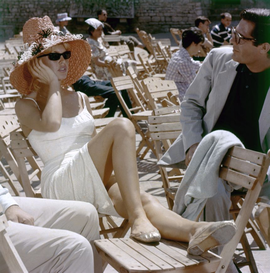 Scooped necklines on feminine sundresses, paired with barely-there ballet flats contributed to the overarching sensuality of Bardot's image.