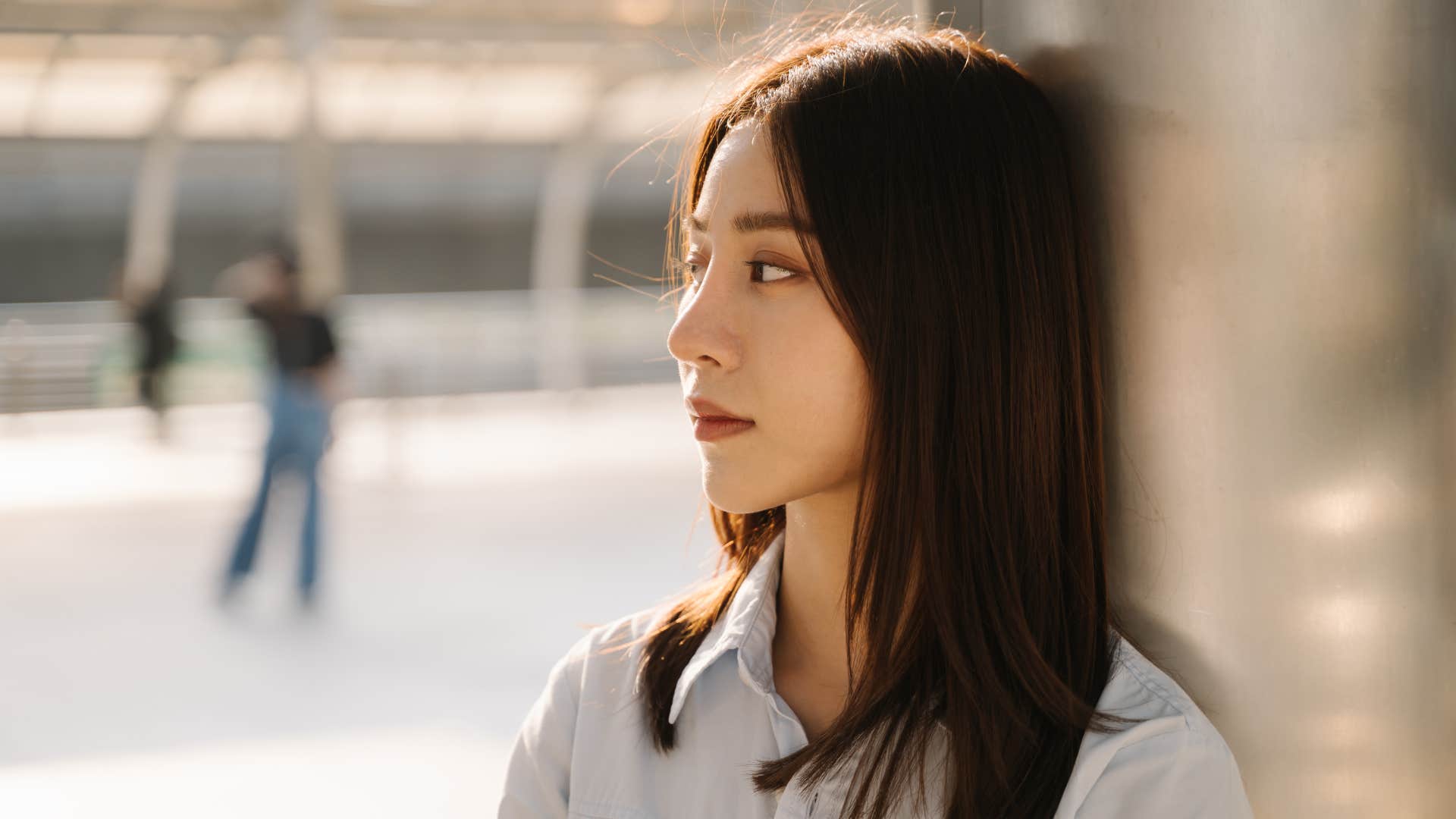 woman zoning out outside unable to focus