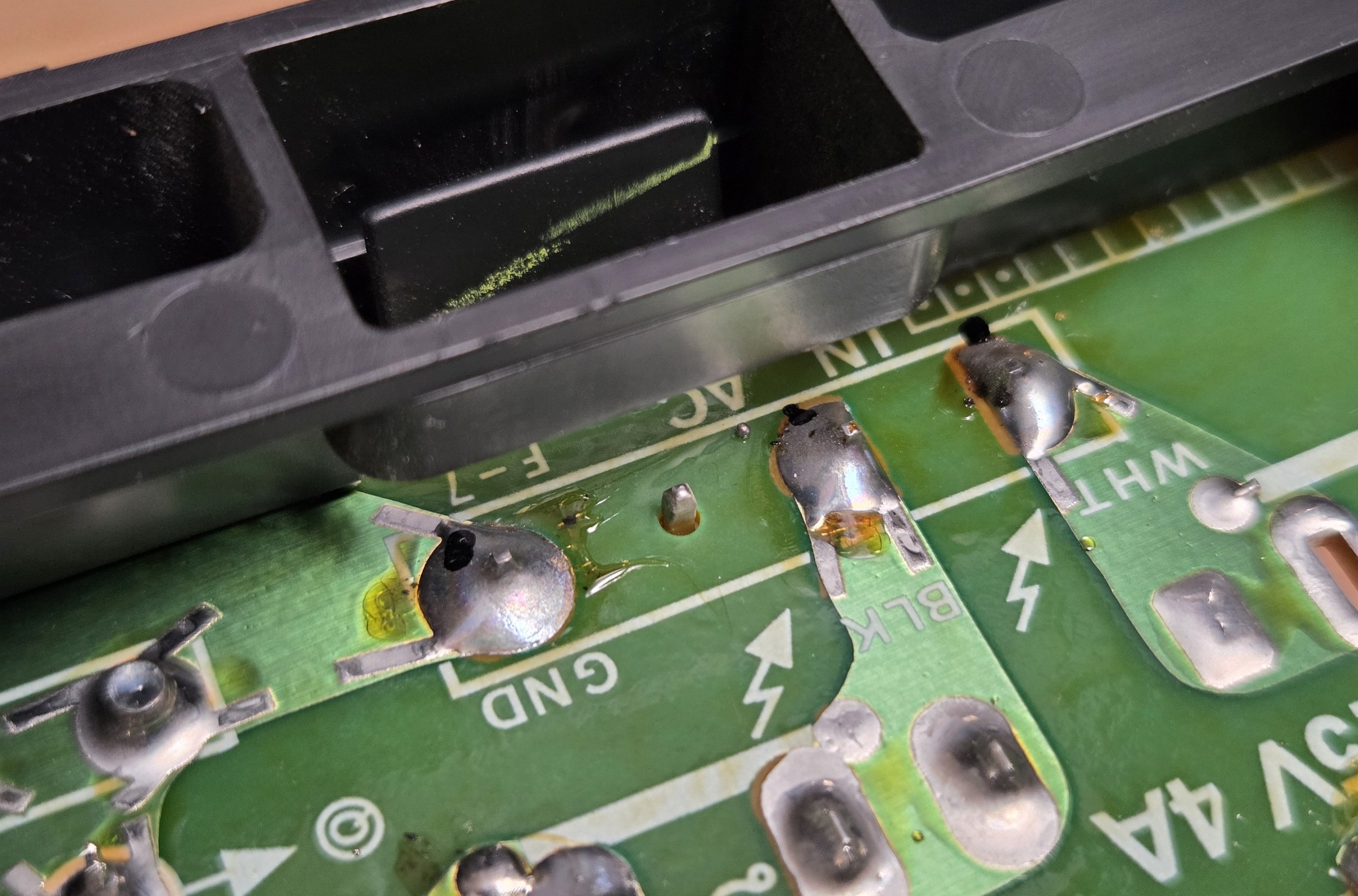 “From what I can see, there are signs of a cracked or weakened solder joint,“ FixBot wrote when I presented this photo. CRT Database founder Andy King tells me these joints are fine.