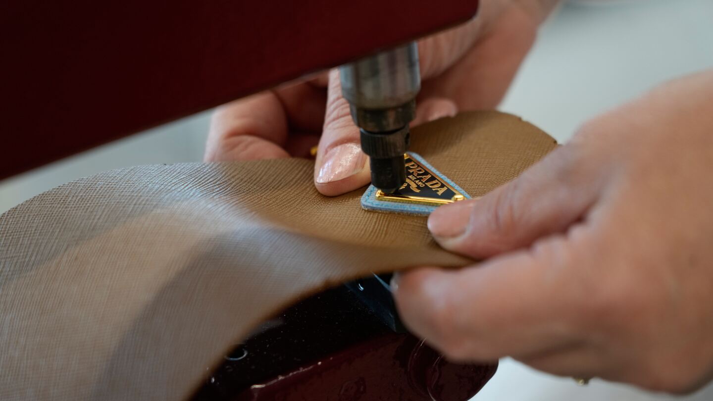  Prada Group says it has purchased fashion rival Versace in a deal worth nearly $1.4 billion