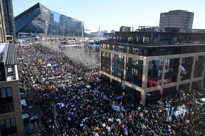 Demonstrators march during an 