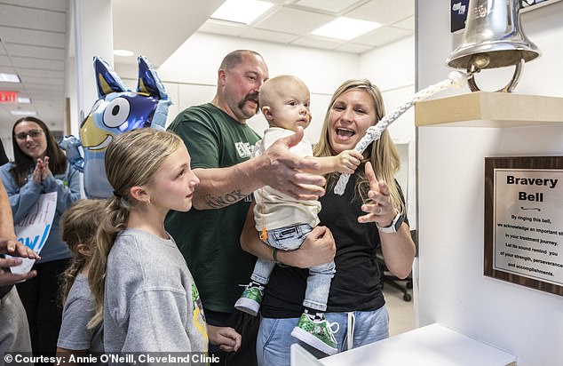 Crew, pictured above with his family, now has no evidence of disease, but he will be closely followed for several years to make sure the cancer does not return