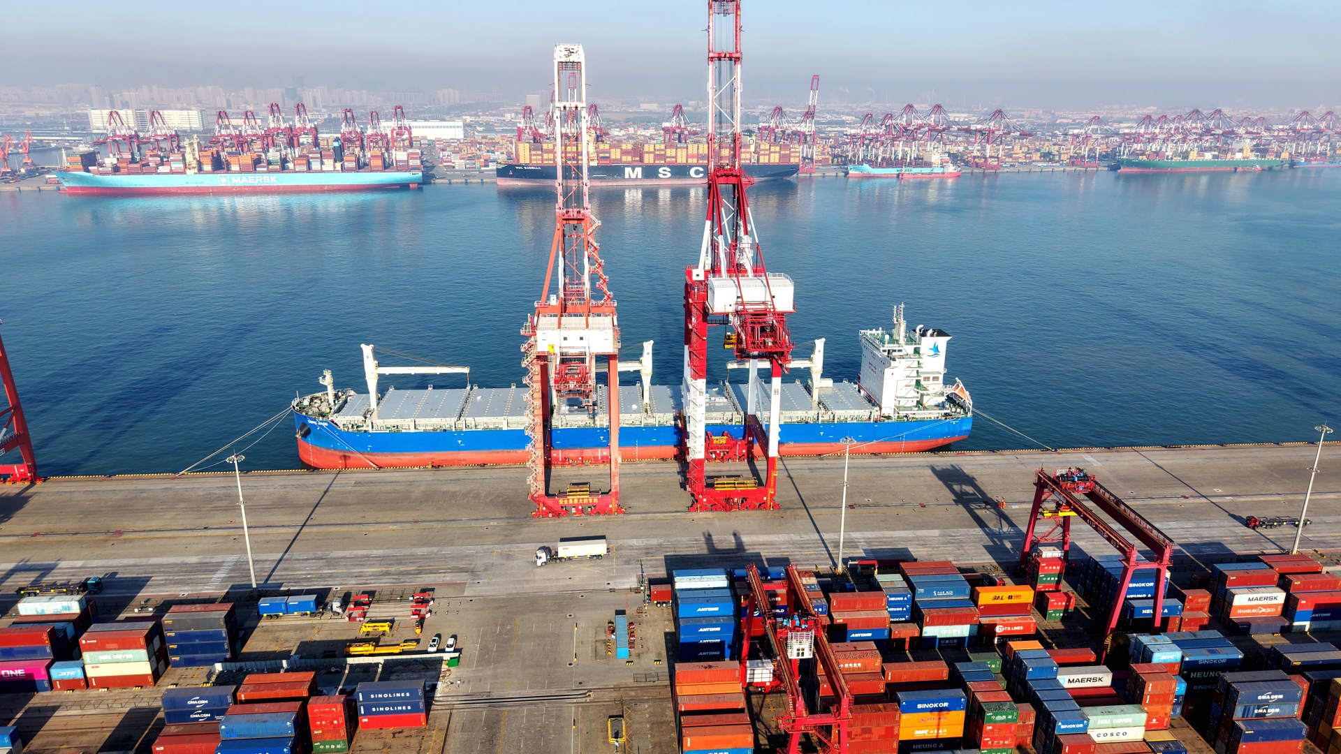  China’s annual trade surplus hits a record $1.2 trillion as December exports beat