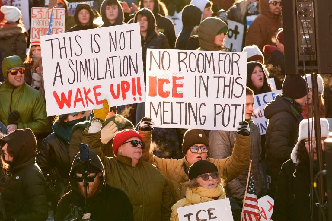 People protest against ICE in Portland, Maine on Friday.