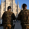Military personnel stand guard in Piazza Duomo ahead of the Milano Cortina 2026 Olympic Games Milan, Italy, on Monday. Agents from ICE's Homeland Security Investigations unit will also be present at the Games, sparking outrage from some Italian politicians.