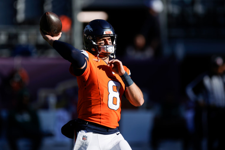 Jarrett Stidham prepares to throw a football