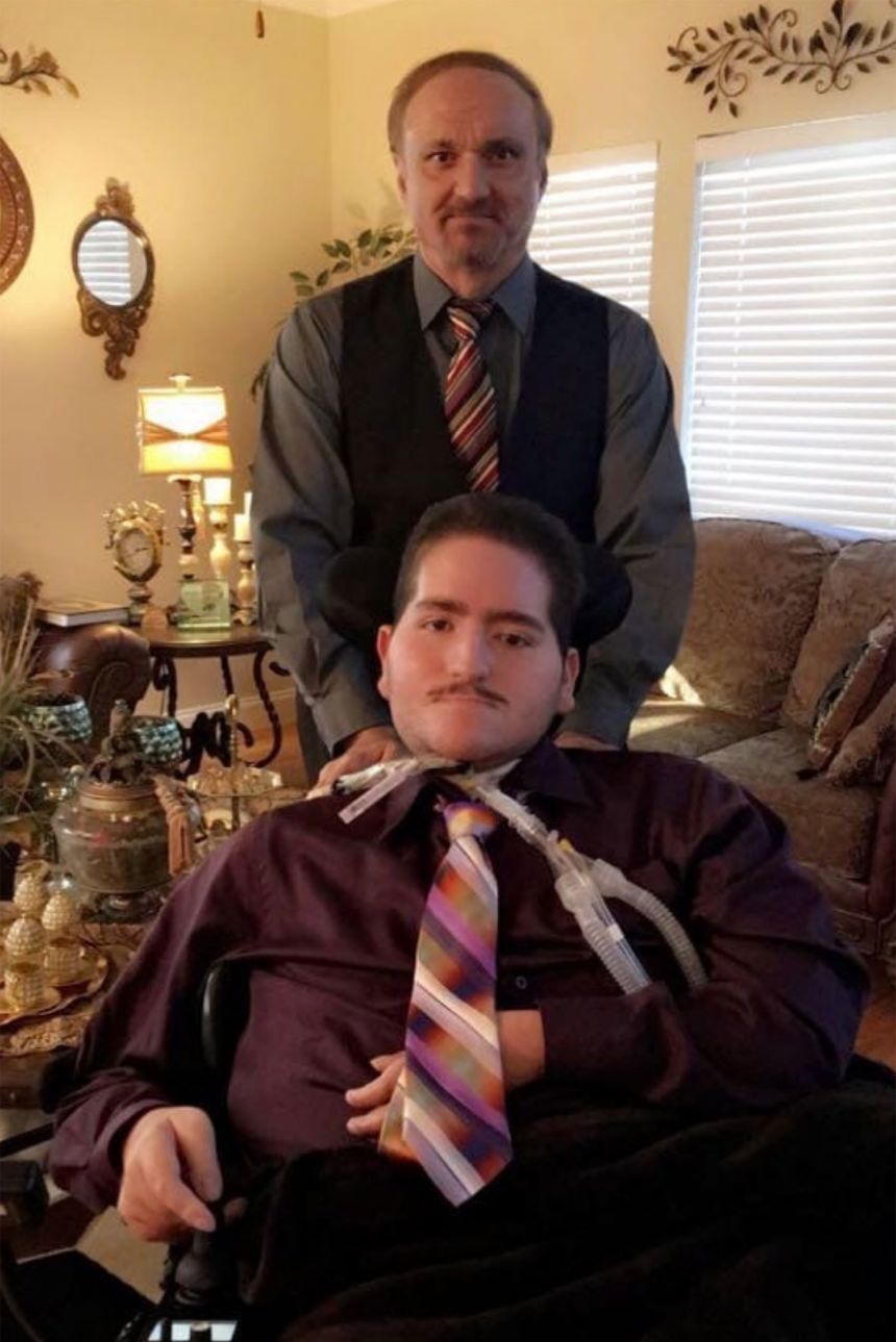 Maher Tarabishi stands behind his late son Wael Tarabishi in an undated photo provided by their family.