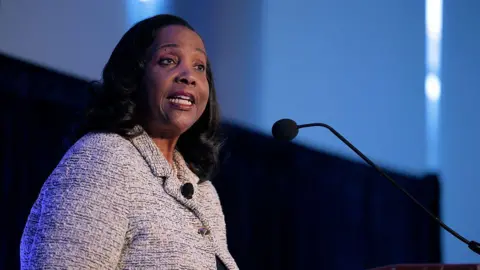 Getty Images Federal Reserve Governor Lisa Cook delivers remarks during an event organized by the Psaros Center for Financial Markets and Policy at the Georgetown University's McDonough School of Business at the university on November 20, 2025 in Washington, DC