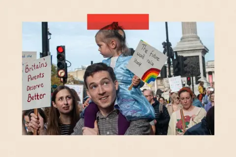 Guy Smallman/Getty Images Parents and children join a childcare protest in London