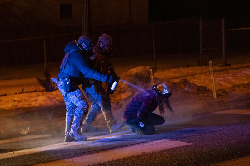 MINNEAPOLIS, MINNESOTA, US. - JANUARY 14: Federal agents deploy tear gas and pepper balls against community members during protest as tensions intensified following a shooting involving federal law enforcement in north Minneapolis, Minnesota, US on January 14, 2026. One week earlier a U.S. Immigration and Customs Enforcement (ICE) agent fatally shot Renee Nicole Good. (Photo by Mostafa Bassim/Anadolu via Getty Images)